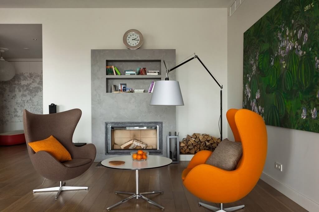 Кресло в интерьере гостиной 20 фото: советы по выбору и стильные и современные модели